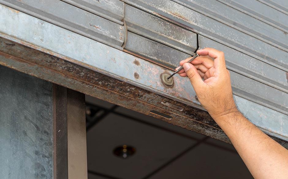 changer barillet porte garage basculante Champagne-sur-Seine